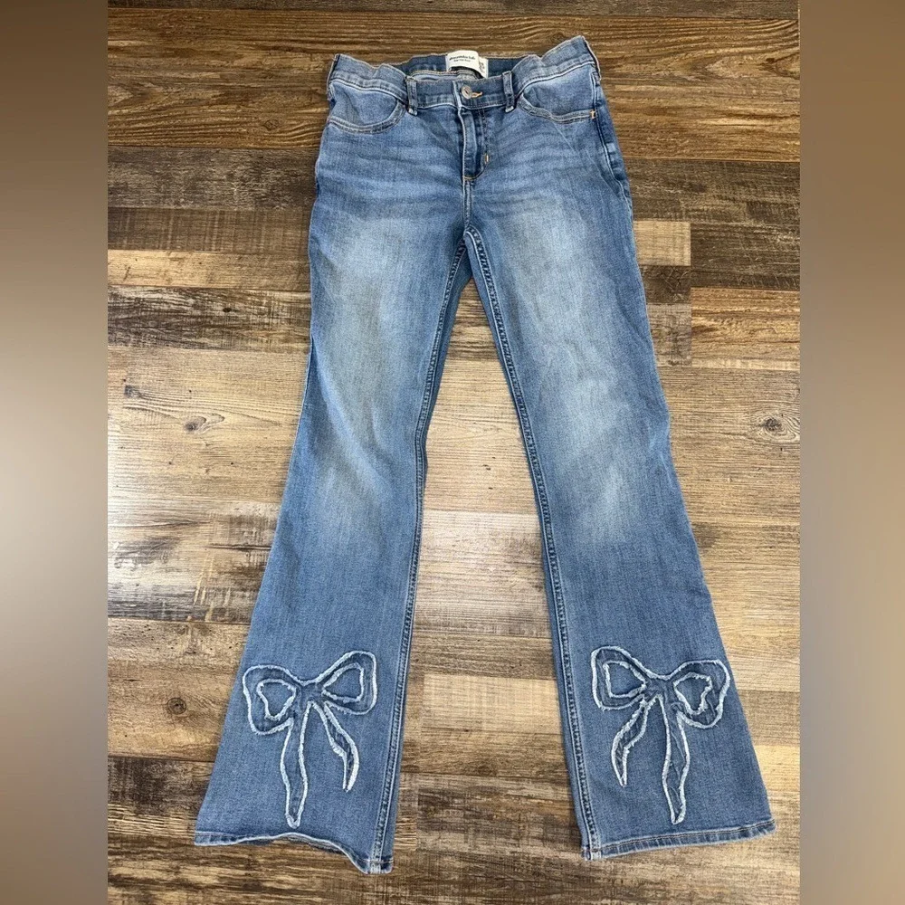 Abercrombie Kids Low Rise Bootcut Jeans Medium Wash Frayed Bow Detail Size 15/16